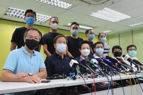 Members of the pan-democracy camp hold a press conference in Hong Kong on July 1, 2020. (Song Bilung/The Epoch Times)