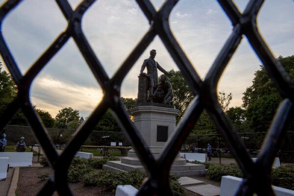 Fencing erected to protect the Emancipation Memorial from people who said they want to tear it down is pictured in Washington on June 26, 2020. (Tasos Katopodis/Getty Images)