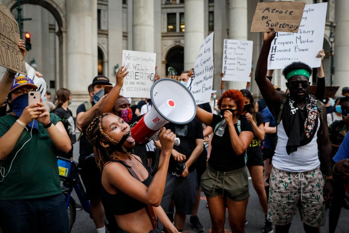 Protesters gather at an encampment outside City Hall in New York, N.Y., on June 30, 2020. (John Minchillo/AP Photo)