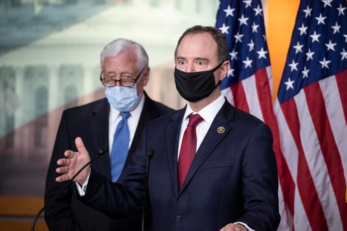 Rep. Adam Schiff (D-Calif.), chairman of the House Intelligence Committee (R) speaks accompanied by House Majority Leader Steny Hoyer (D-Md.), during a news conference on Capitol Hill, after a meeting at the White House on June 30, 2020. (Alex Brandon/AP Photo)