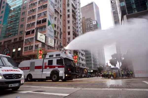 Hong Kong police fire water cannon at Hennessy Road, Hong Kong, on July 1, 2020. (Hong Kong edition of The Epoch Times)