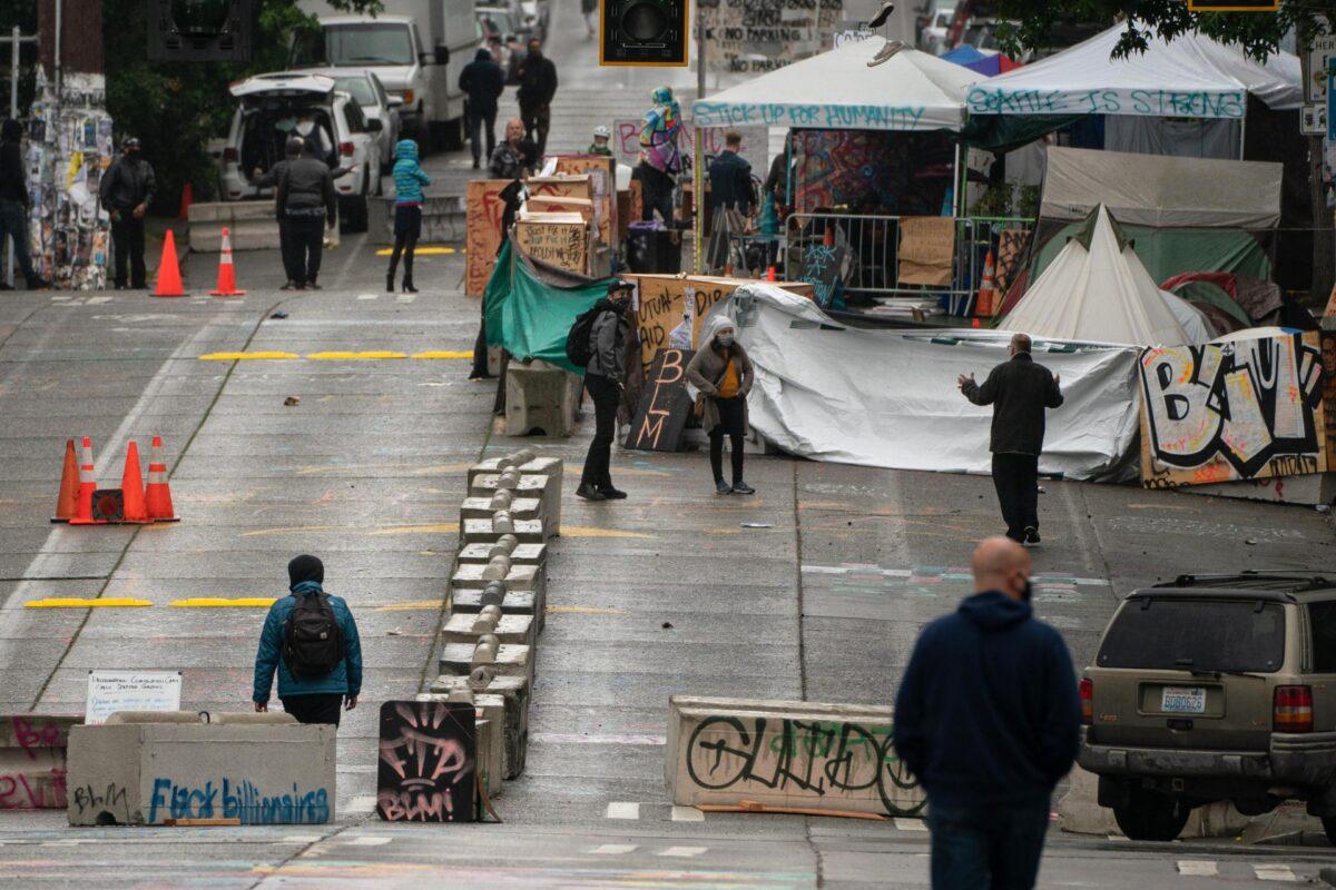 Concrete barriers are situated outside of the Seattle Police Department's vacated East Precinct inside the Capitol Hill Organized Protest (CHOP) zone in Seattle on June 30, 2020. (David Ryder/Getty Images)