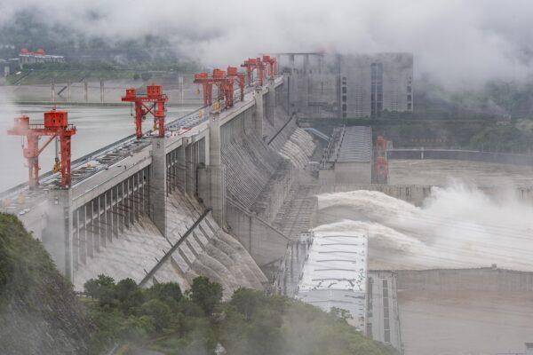 The Three Gorges Dam, a gigantic hydropower project on the Yangtze River, discharges water in Yichang, central China's Hubei province on June 29, 2020. (STR/AFP via Getty Images)