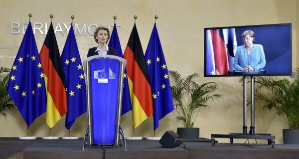 President of the European Commission Ursula von der Leyen (L) addresses a joint press conference with Germany's Chancellor Angela Merkel at the start of the German presidency by video conference at the EU headquarters in Brussels on July 2, 2020. (John Thys/AFP via Getty Images)
