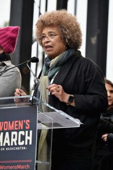 Angela Davis speaks onstage during the Women's March on Washington on Jan. 21, 2017. Davis, a former member of the Communist Party USA, is one of the country's most prominent prison abolitionists. (Theo Wargo/Getty Images)