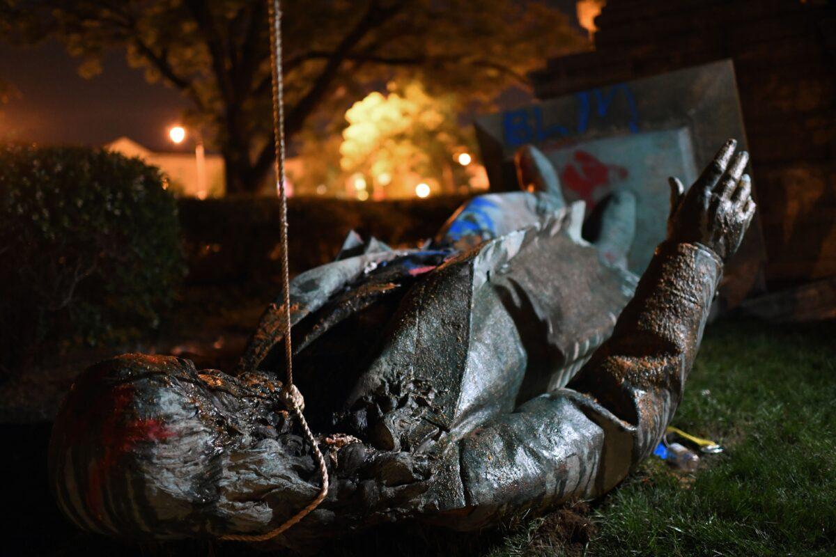 The statue of Confederate general Albert Pike is pictured after it was toppled by vandals in Washington on June 19, 2020. (Eric Baradat/AFP via Getty Images)
