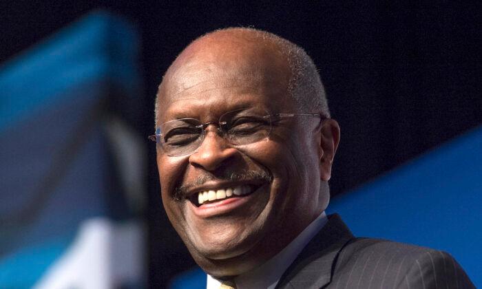 Herman Cain Hospitalized After Testing Positive for COVID-19