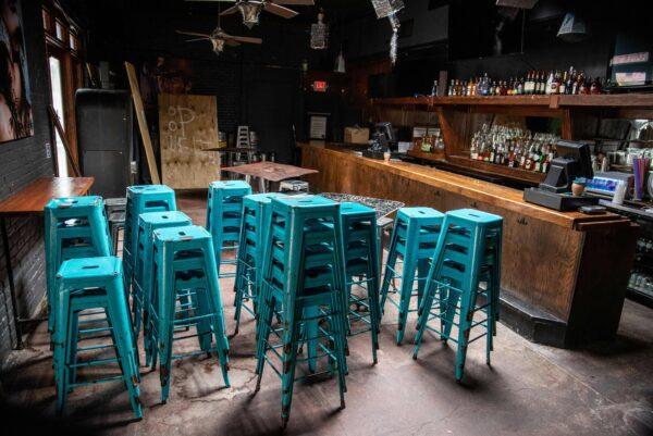 Chairs sit stacked inside a closed bar in Austin, Texas, on June 26, 2020. (Sergio Flores/AFP/Getty Images)