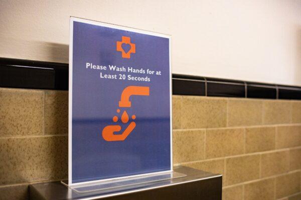 To prevent the spread of the CCP virus, a sign reminding guests to wash their hands well in a restroom at The Bowers Museum in Santa Ana, Calif., on June 30, 2020. (John Fredricks/The Epoch Times)