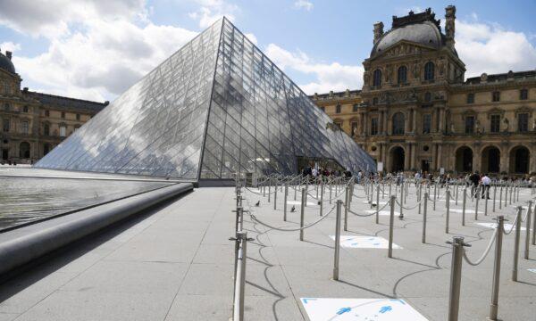 Social distancing marks are seen on the floor outside the Louvre museum as it reopens its doors following its 16 week closure due to lockdown measures caused by the COVID-19 coronavirus pandemic, at the Louvre, in Paris, France, on July 6, 2020. (Pascal Le Segretain/Getty Images)