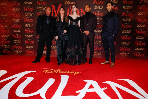 Cast members Ron Yuan, Yifei Liu, Jason Scott Lee and Yoson An pose with director Niki Caro, at the European premiere for the film "Mulan" in London, Britain on March 12, 2020. (Henry Nicholls/Reuters)