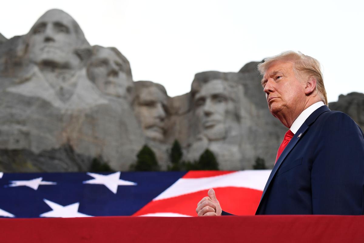 U.S. President Donald Trump gestures as he arrives for the Independence Day events at Mount Rushmore National Memorial in Keystone, South Dakota, July 3, 2020. (SAUL LOEB/AFP via Getty Images)