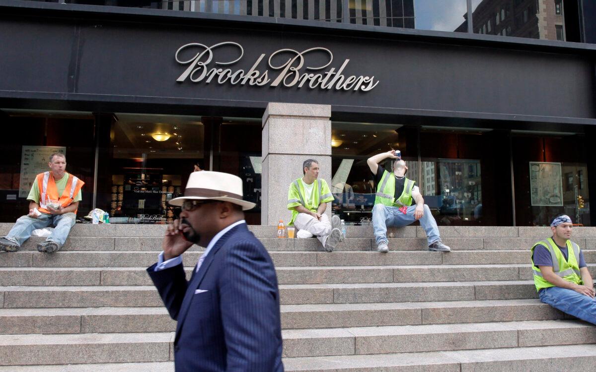 A man walks by a Brooks Brothers store on Church St. in New York on Sept. 11, 2001. (Mark Lennihan/File/AP Photo)