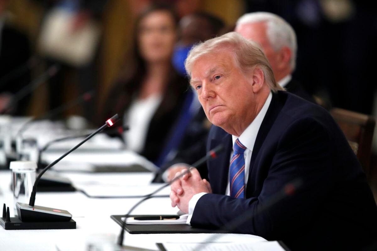 President Donald Trump listens during a "National Dialogue on Safely Reopening America's Schools," event in the East Room of the White House, on July 7, 2020. (Alex Brandon/AP Photo)