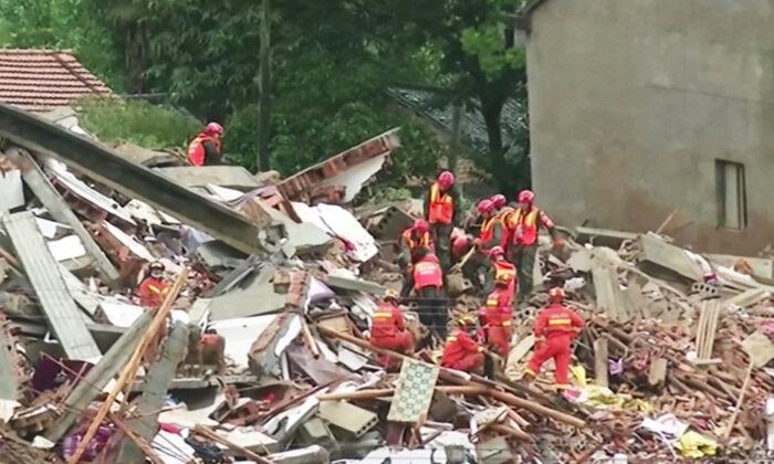 Landslide Buries 9 in Central China as Country Suffers Worst Floods in Years