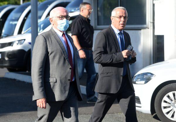 The mayors of Bayonne, Jean-Rene Etchegaray (L), and Anglet, Claude Olive (R), arrive for a meeting with the French Junior Transport Minister and bus drivers of the public transport network of Bayonne, southwestern France, on July 7, 2020. (Iroz Gaizka/AFP via Getty Images)