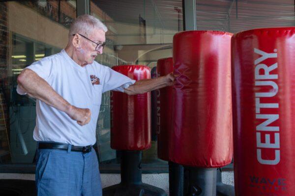  Art Ballard always ends his gym session punching the heavy bag at least 60 times in a row. (Heidi de Marco, KHN)