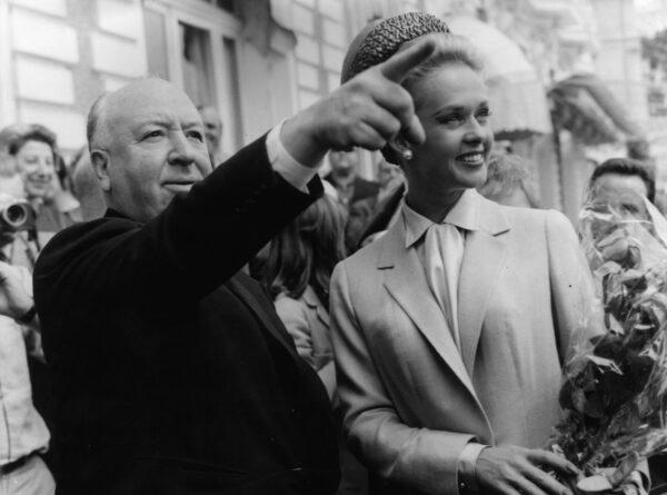 Alfred Hitchcock and actress Tippi Hedren explore Cannes together after the premiere of his latest thriller, 'The Birds,' in which she plays the title role, on May 9, 1963. (Keystone/Getty Images)