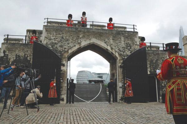 A drawbridge is lowered during a ceremony with Yeoman Warders and guardsmen to mark the reopening of the Tower of London for visitors, in London, July 10, 2020. (Matt Dunham/AP Photo)