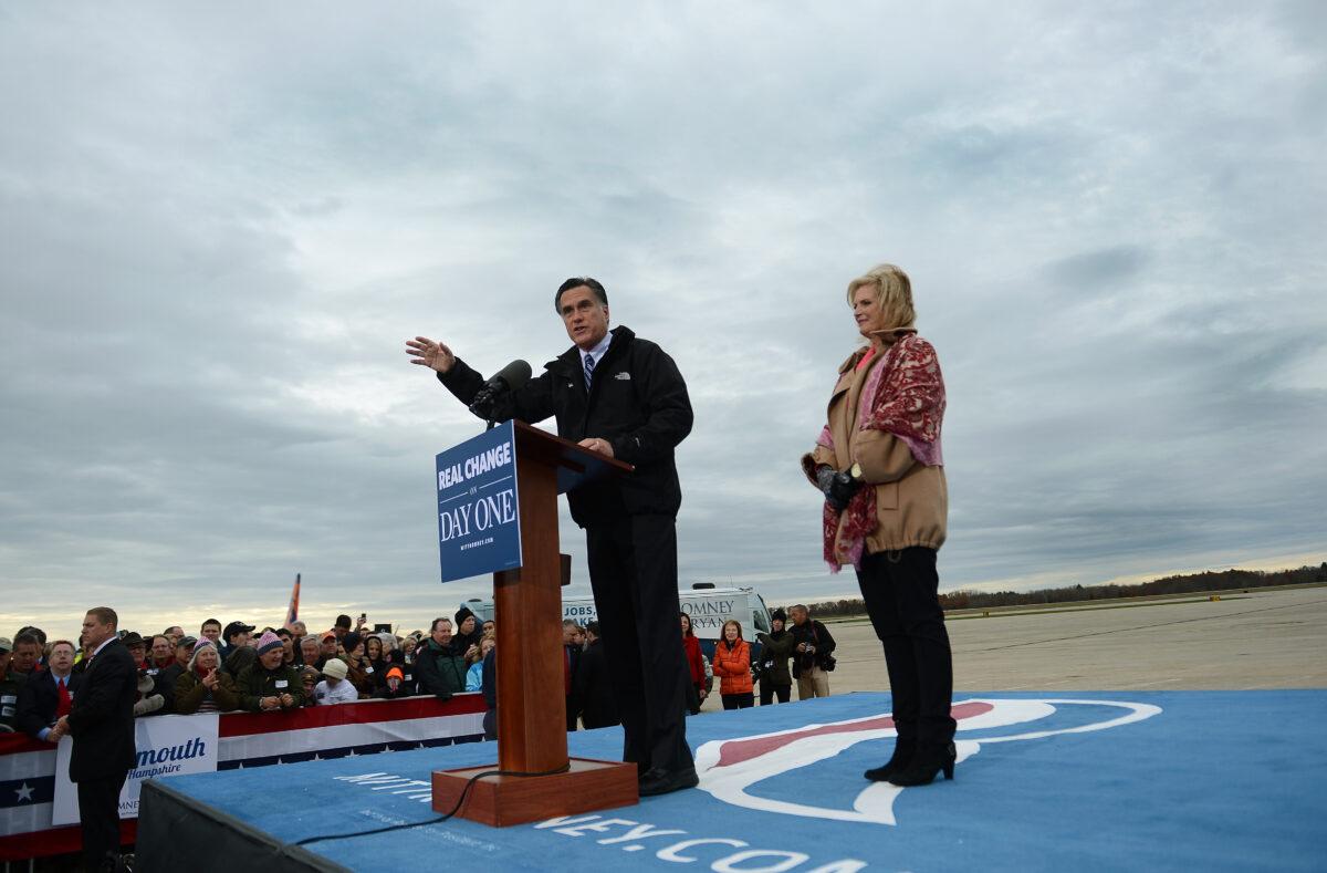 Republican Presidential candidate Mitt Romney, accompanied by his wife Ann Romney holds a rally at Portsmouth International Airport in Newington, N.H., in a Nov. 3, 2012, file photograph. (Emmanuel Dunand/AFP via Getty Images)
