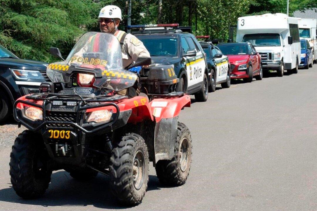 Quebec Police Say They Found 2 Bodies in St Apollinaire During Search for 2 Girls