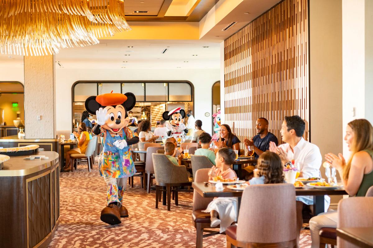 Guests at Disney’s Riviera Resort at Walt Disney World Resort in Lake Buena Vista, Fla., can see Mickey Mouse, Minnie Mouse, Donald Duck, and Daisy Duck during breakfast at Topolino’s Terrace – Flavors of the Riviera, the resort’s rooftop restaurant. During the resort’s phased reopening, characters maintain proper physical distancing while parading through the restaurant during mealtimes. (Matt Stroshane/Walt Disney World)