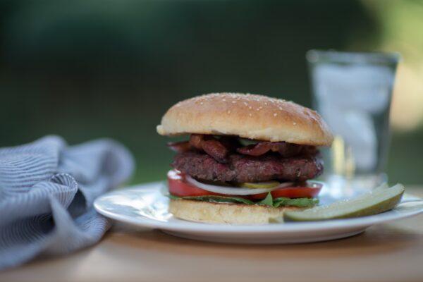 A homemade burger bun in action. (Photo by Susan Butler)
