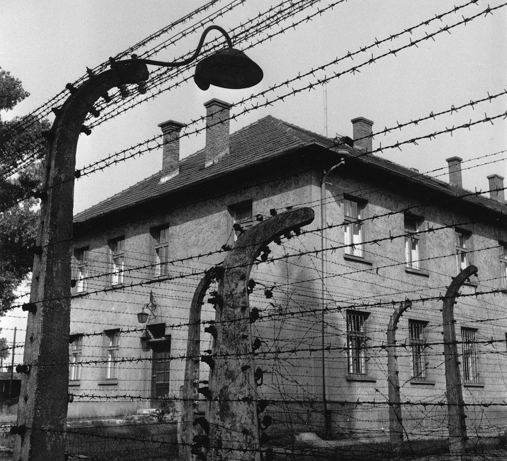 circa 1955: Barbed-wire fence at the concentration camp, Auschwitz, which contained a double layer of barbed wire. (Three Lions/Getty Images)