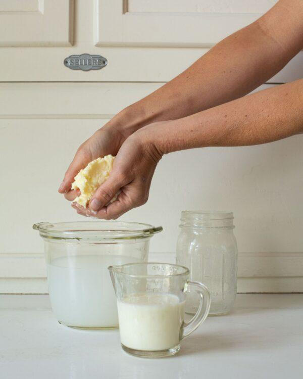 Remove the solid butter from the jar, rinse it with cold water, and squish it into a ball. (Angie Mosier)