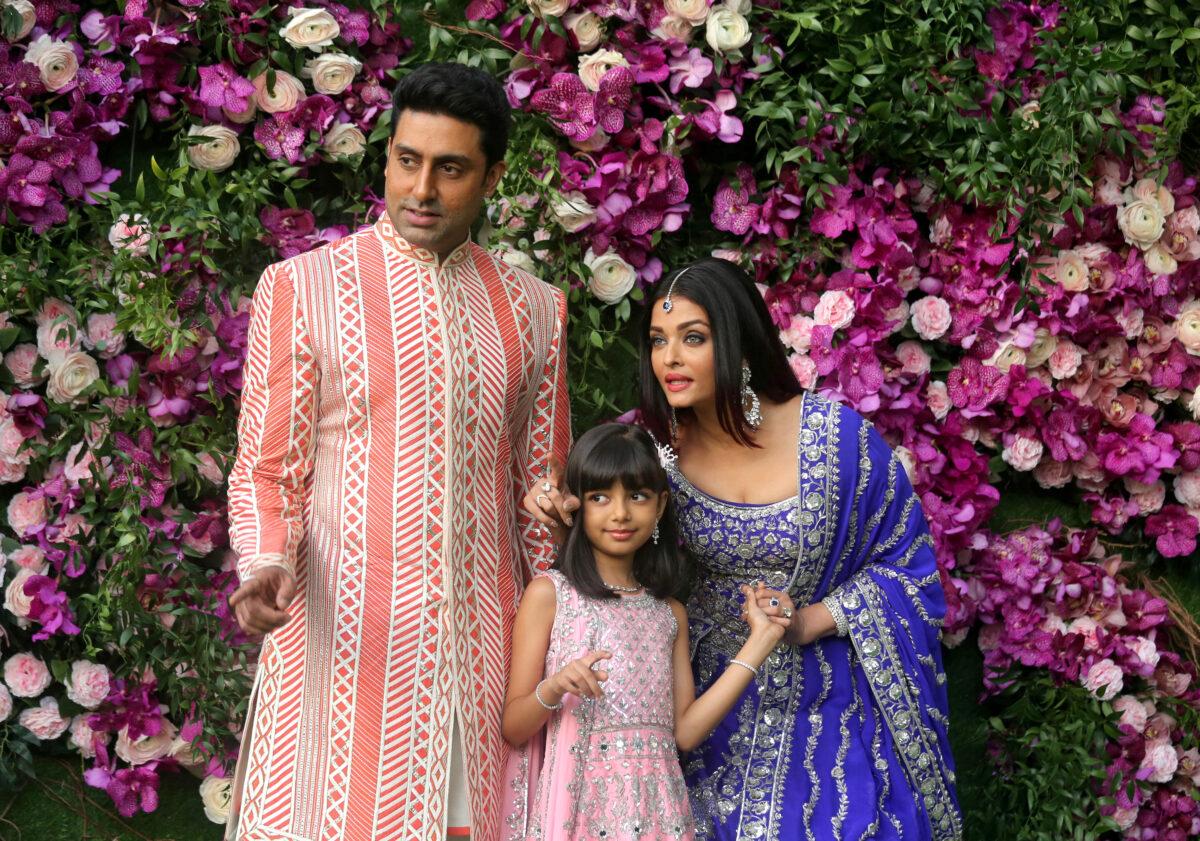 Indian film actor Abhishek Bachchan, his wife Aishwarya Rai and their daughter Aaradhya at the wedding of Akash Ambani, the son of Reliance Industries chairman Mukesh Ambani, in Mumbai, India, on March 9, 2019. (Francis Mascarenhas/Reuters)