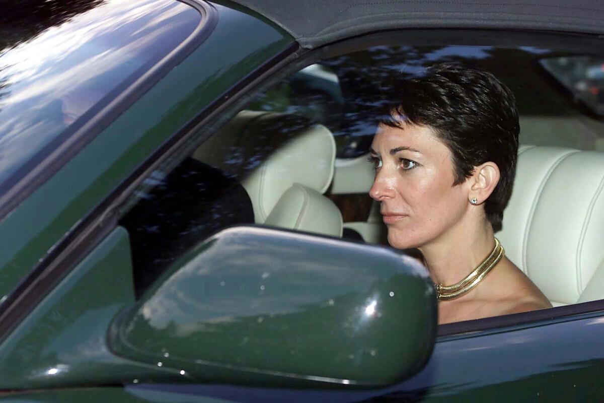 In this Sept. 2, 2000 file photo, British socialite Ghislaine Maxwell, driven by Britain's Prince Andrew leaves the wedding of a former girlfriend of the prince, Aurelia Cecil, at the Parish Church of St Michael in Compton Chamberlayne near Salisbury, England.  (Chris Ison/PA via AP, File)