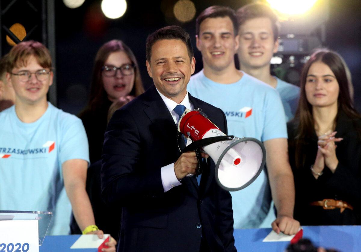 Mayor of Warsaw and presidential candidate Rafal Trzaskowski addresses his supporters following the announcement of the presidential election's exit poll results in Warsaw, Poland, on July 12, 2020. (Kuba Atys/Agencja Gazeta via Reuters)