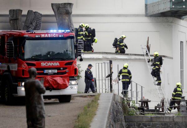 Firefighters take control of a fire in a technical building of the Kampa Museum in Prague, Czech Republic, on July 15, 2020. (Petr David Josek/AP Photo)