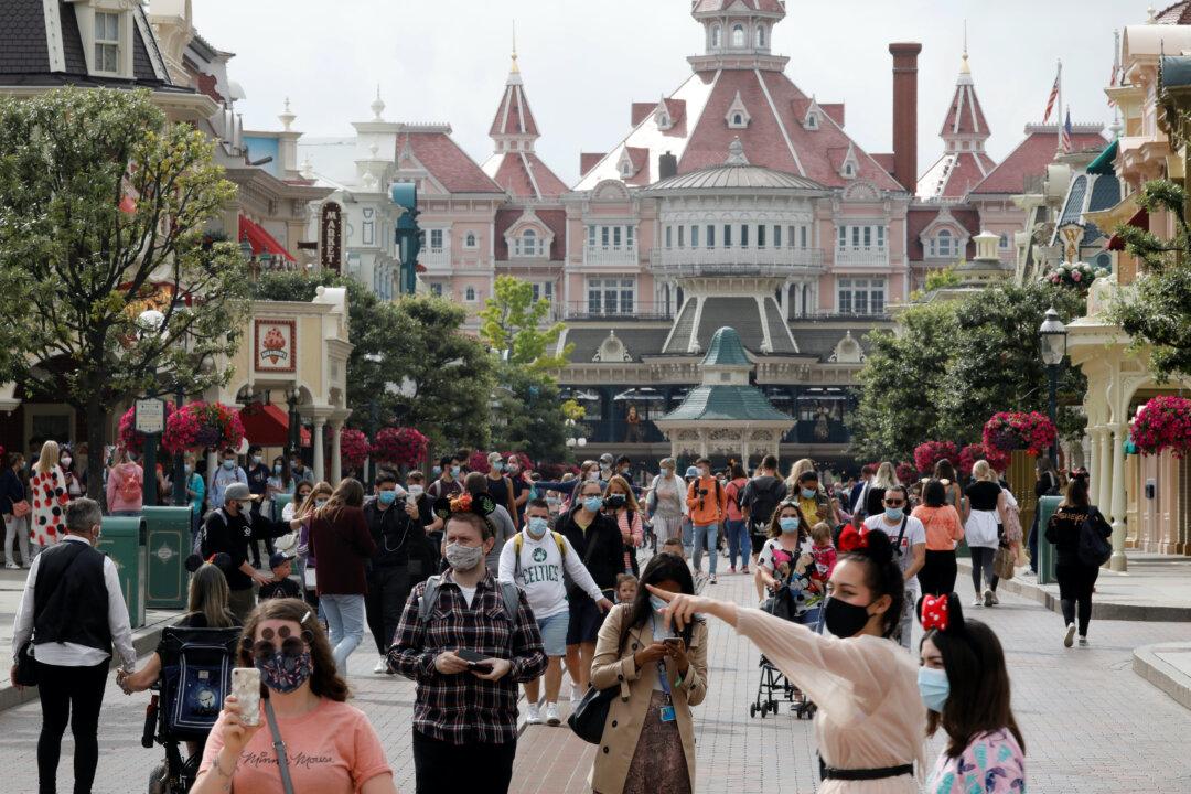 Masks and Mickey: Disneyland Paris Reopens After Four-Month Closure