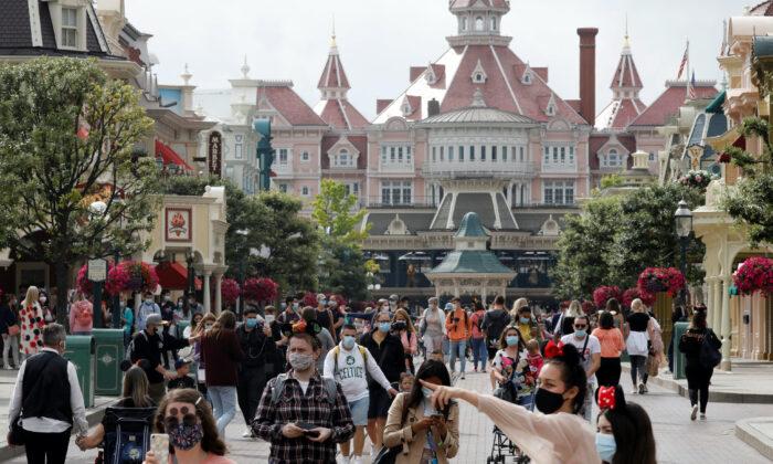 Masks and Mickey: Disneyland Paris Reopens After Four-Month Closure