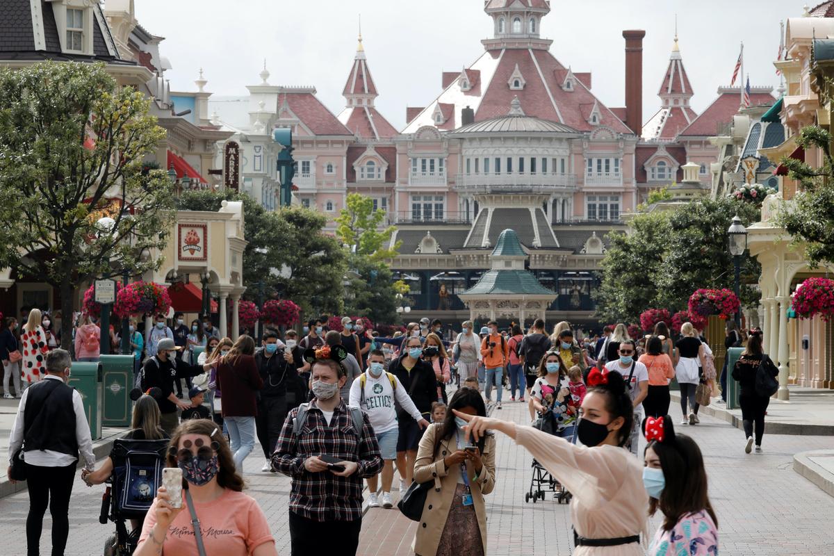 Masks and Mickey: Disneyland Paris Reopens After Four-Month Closure