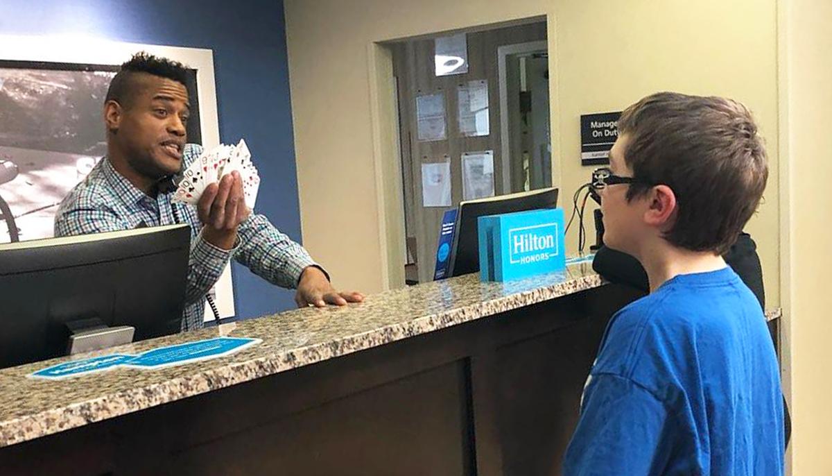 Hotel Worker and Boy With Autism Bond Over Card Tricks, Mom Pens ‘Thank You’ Note