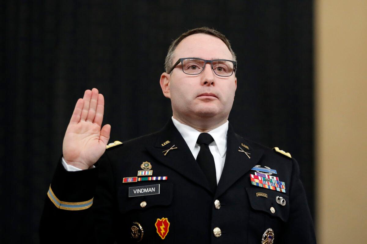 In this Nov. 19, 2019, file photo National Security Council aide Lt. Col. Alexander Vindman is sworn in to testify before the House Intelligence Committee on Capitol Hill in Washington. (Andrew Harnik/AP Photo)