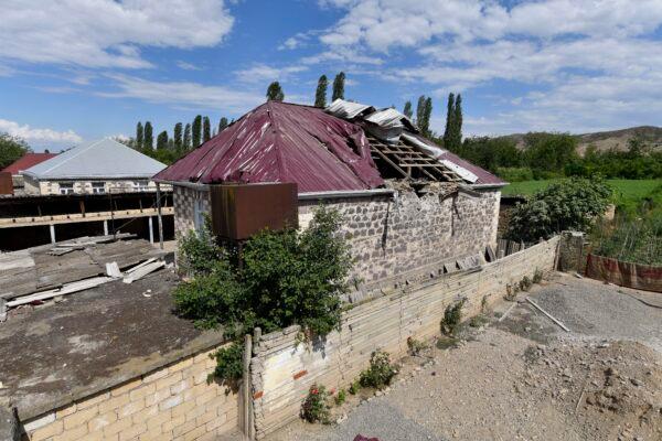 A damaged house is seen after shelling by Armenian forces in the Tovuz region of Azerbaijan, on July 14, 2020. (Ramil Zeynalov/AP Photo)
