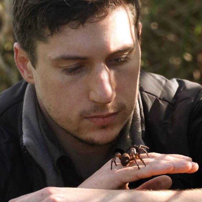 Dr. Jeremy Wilson pictured with a trapdoor spider on his hand (Courtesy of Eamon Amsters via <a href="https://www.facebook.com/jeremywilson28">Jeremy Wilson</a>)