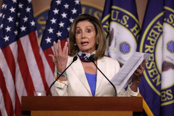 Speaker of the House Nancy Pelosi (D-Calif.) talks to reporters during her weekly news conference in the U.S. Capitol Visitors Center in Washington, on July 16, 2020. (Chip Somodevilla/Getty Images)