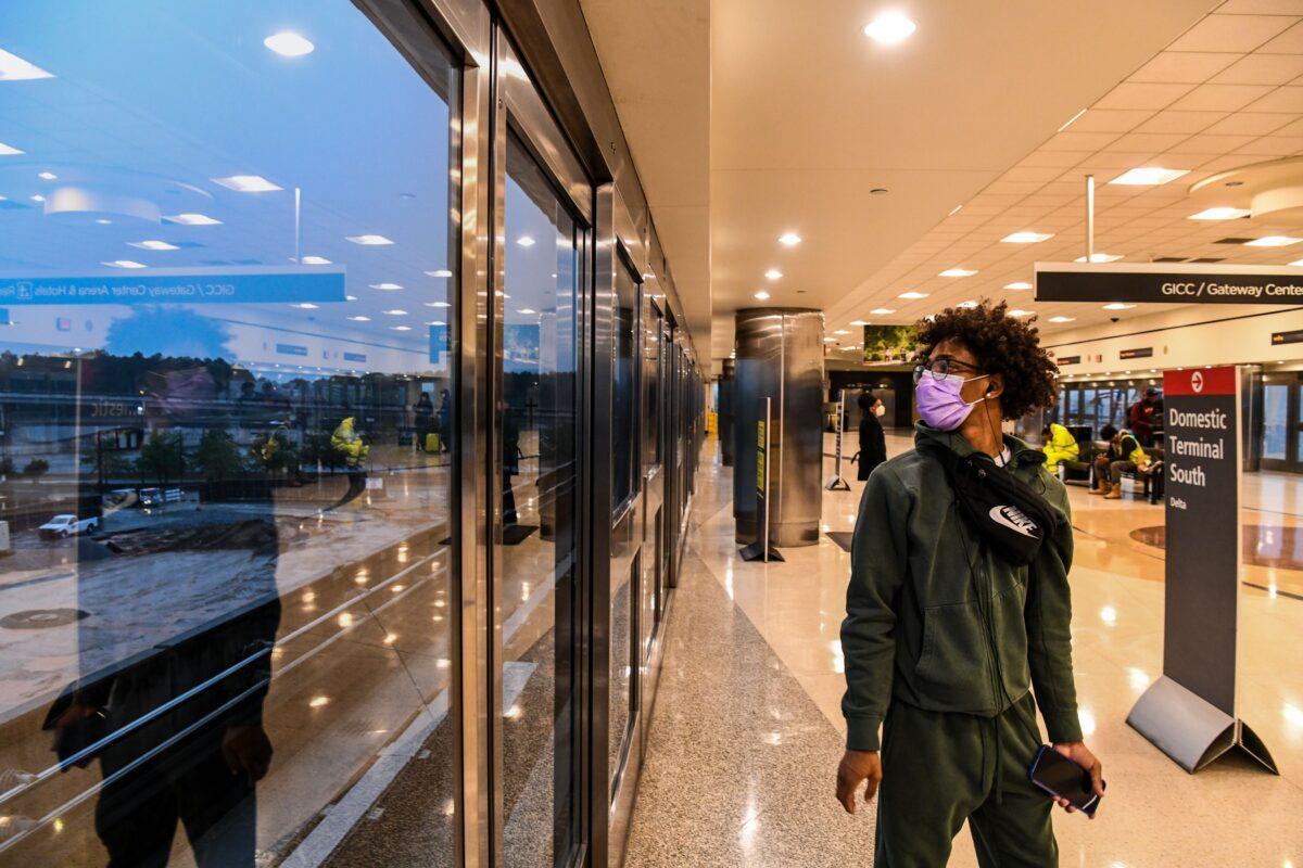 A man wears a mask as he arrives at Hartsfield-Jackson Atlanta International Airport on April 23, 2020. (Chandan Khanna/AFP via Getty Images)