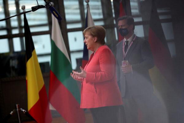 German Chancellor Angela Merkel makes a statement as she arrives for the first face-to-face EU summit since the coronavirus disease (COVID-19) outbreak, in Brussels, Belgium, on July 17, 2020. (Francisco Seco/Pool via Reuters)