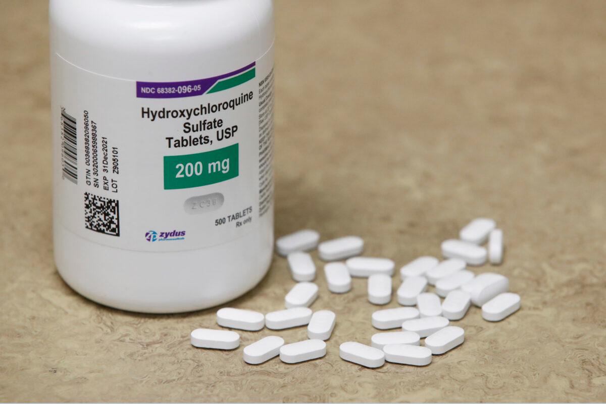 A bottle and pills of hydroxychloroquine sit on a counter at Rock Canyon Pharmacy in Provo, Utah, on May 20, 2020. (George Frey/AFP via Getty Images)