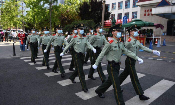 Chinese Authorities Secure Police Funding in Spite of Nationwide Budget Cuts