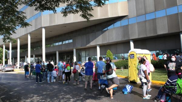 Hundreds of unemployed Kentucky residents wait in long lines outside the Kentucky Career Center for help with their unemployment claims in Frankfort, Ky., on June 19, 2020. (John Sommers II/Getty Images)