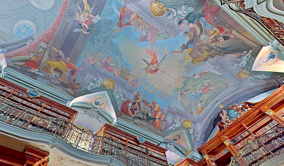 The ceiling of the Klementinum, decorated with frescoes by Jan Hiebl. (Screenshot/<a href="https://www.google.com/maps/@50.0867579,14.4164798,2a,75y,120.87h,152.19t/data=!3m6!1e1!3m4!1s7ZBmw_AO3aoVQAr3AM5lPw!2e0!7i13312!8i6656">Google Maps</a>)