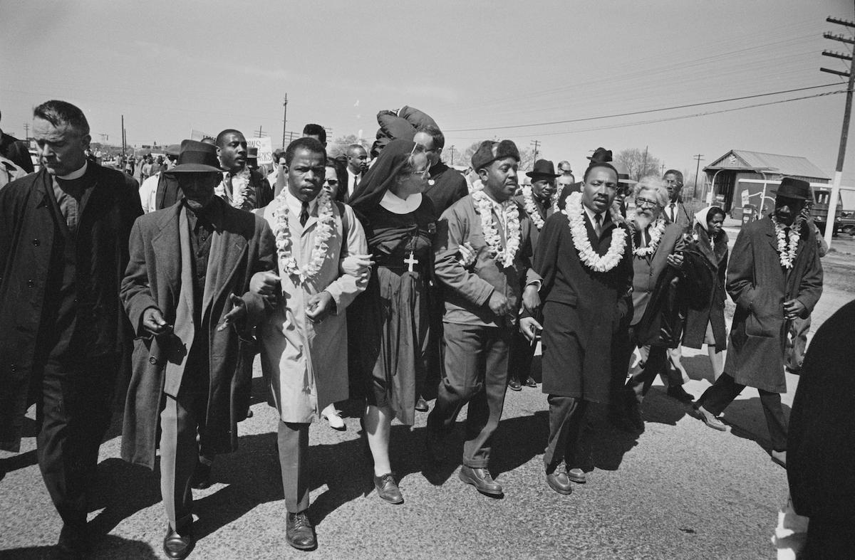 Dr. Martin Luther King Jr. (1926 - 1990), John Lewis (3rd from left in the front line), and others lead a voting rights march out of Selma, Ala., on March 21, 1965. (William Lovelace/Daily Express/Hulton Archive/Getty Images)