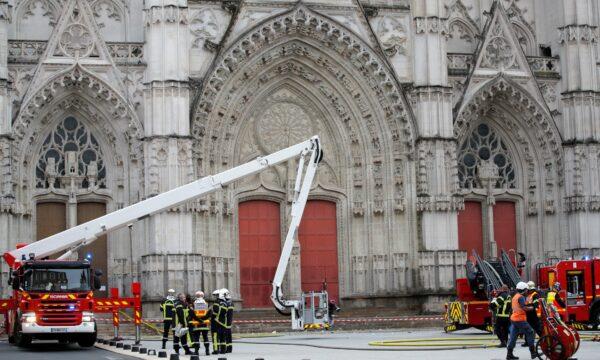 French firefighters work at the scene of a blaze at the Cathedral of Saint Pierre and Saint Paul in Nantes, France, on July 18, 2020. (Stephane Mahe/Reuters)