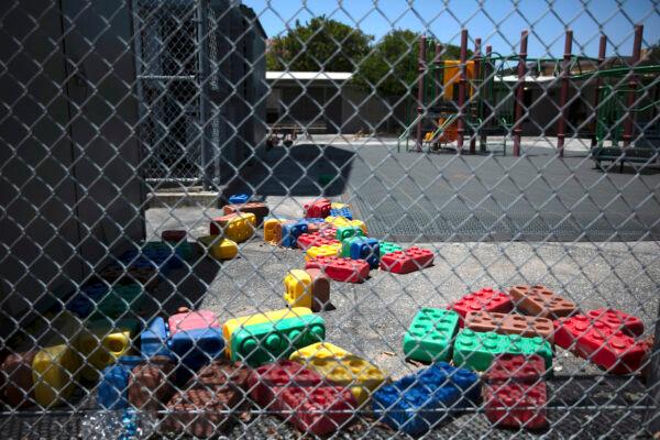 Toys are scattered in the playground of an elementary school in Los Angeles, California, on July 17, 2020. (AP Photo/Jae C. Hong)